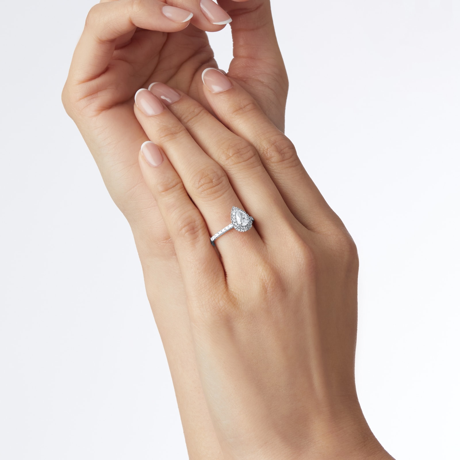 Goldsmiths Platinum 0.80cttw Diamond Pear Cut Halo Engagement Ring