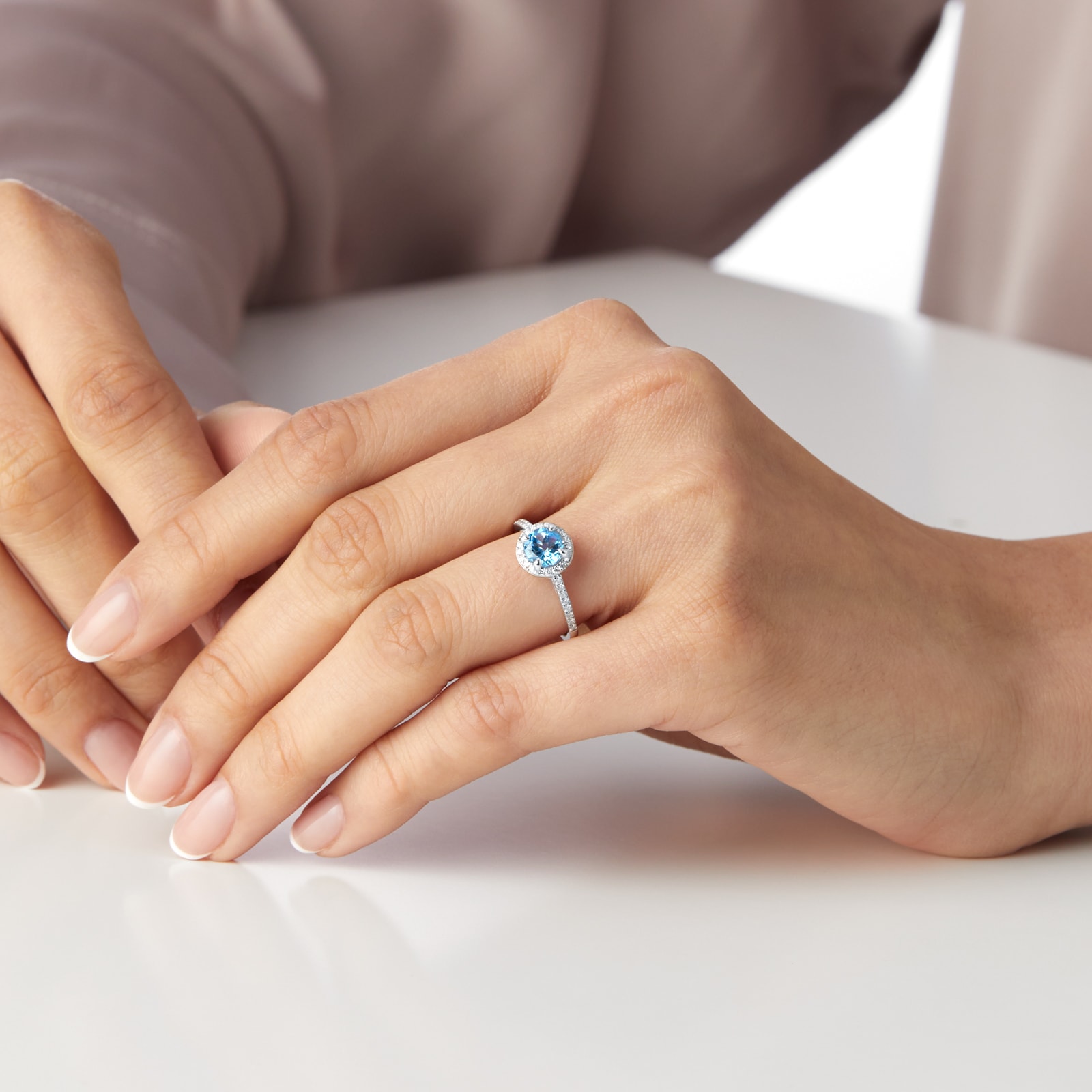 Goldsmiths 9ct White Gold 6x6mm Blue Topaz And Diamond Round Halo Ring